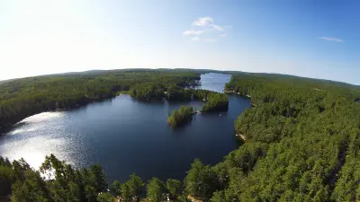 Aerial view from the north end of Mousam Lake in Shapleigh, with wooded islands and peninsulas.