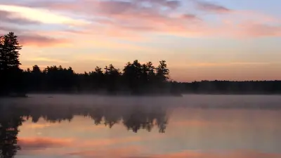 Sunrise over Trickey Pond in Naples, Maine